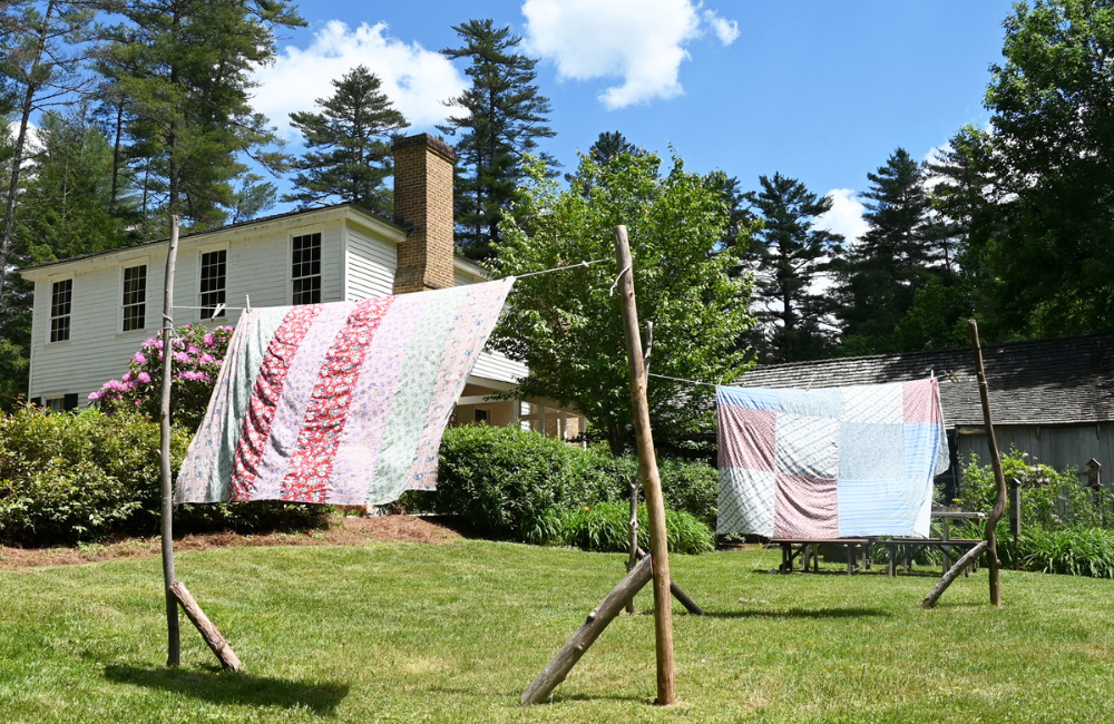 Airing of the Quilts outdoors in the breeze in Cashiers